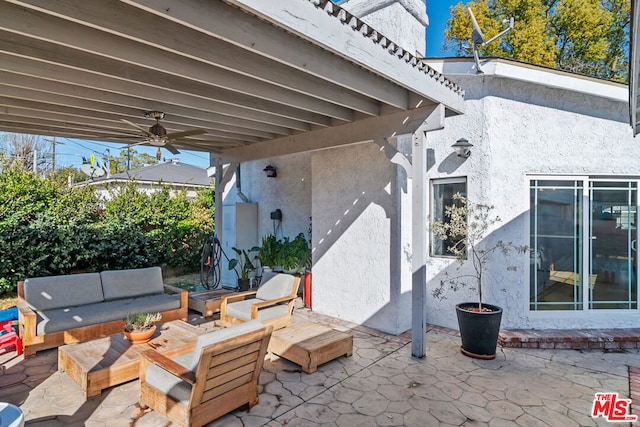 view of patio / terrace with ceiling fan and outdoor lounge area