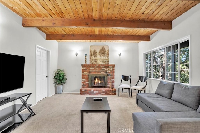 carpeted living room with a fireplace, vaulted ceiling with beams, and wood ceiling