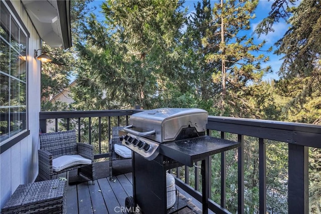 wooden deck with area for grilling