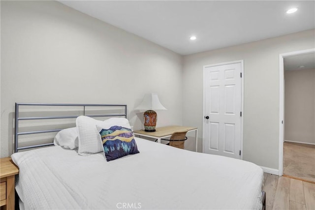 bedroom featuring light hardwood / wood-style flooring