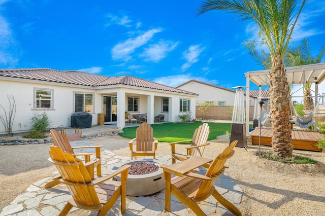 view of patio / terrace featuring a pergola, grilling area, and an outdoor fire pit