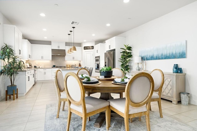 dining room featuring light tile patterned flooring