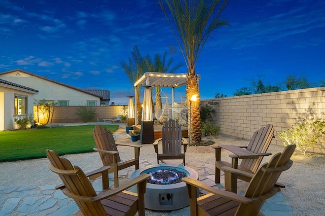 view of patio featuring an outdoor fire pit