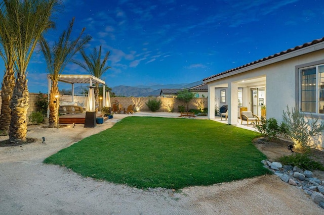 view of yard with a pergola and a patio area