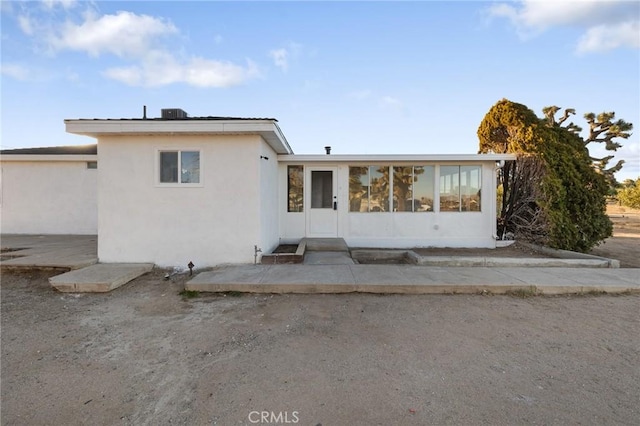 view of front of house with a patio area