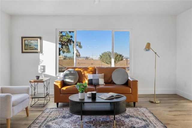 sitting room with light hardwood / wood-style floors