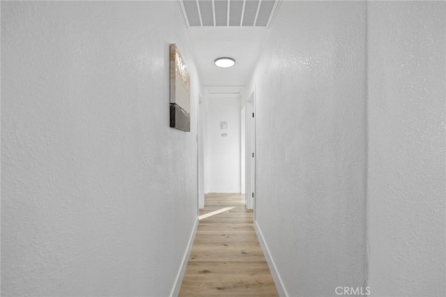 hall featuring light wood-type flooring