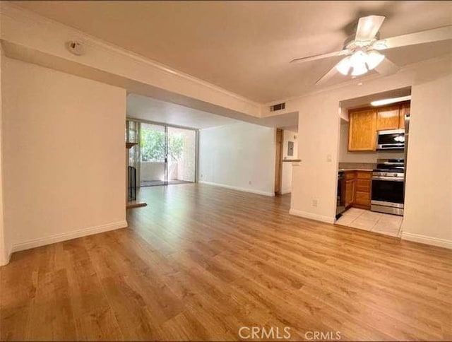 unfurnished living room with ceiling fan and light hardwood / wood-style flooring