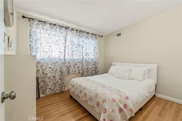 bedroom featuring light hardwood / wood-style flooring