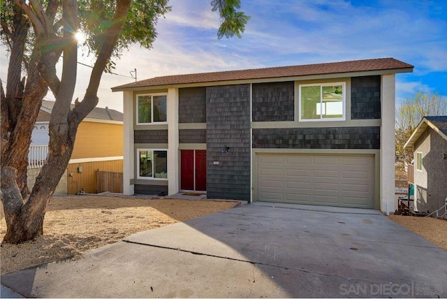 view of front of property featuring a garage