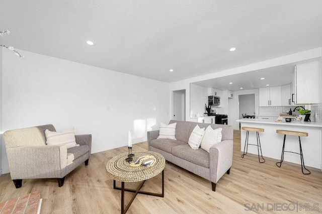 living room featuring light hardwood / wood-style floors