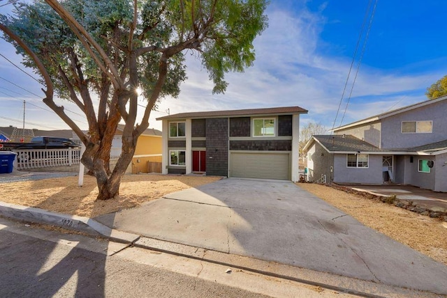 view of front of property featuring a garage