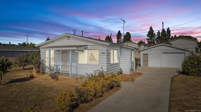 view of front of house featuring an outbuilding and a garage