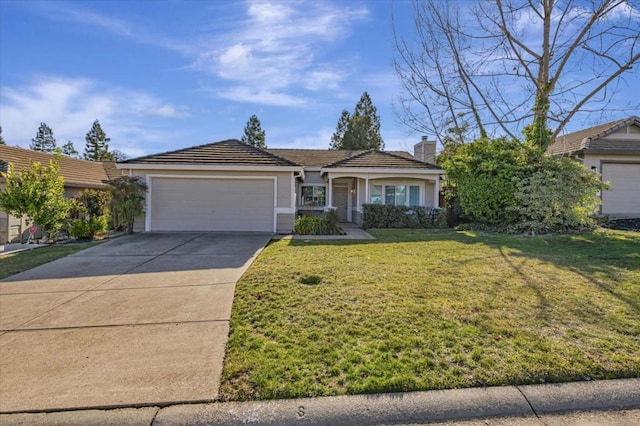 ranch-style home featuring a garage and a front lawn