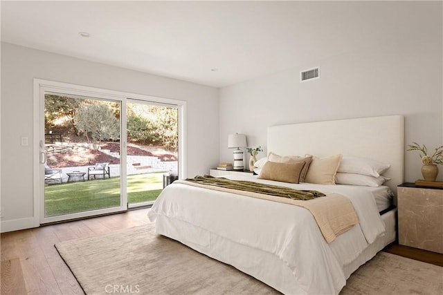 bedroom with visible vents, baseboards, light wood-style flooring, access to outside, and recessed lighting