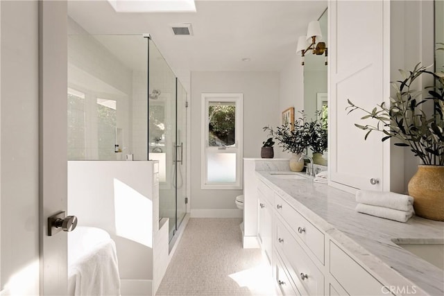 4031 Deerhorn Dr, Sherman Oaks, CA 91403 - bathroom with toilet, double vanity, a shower stall, and baseboards