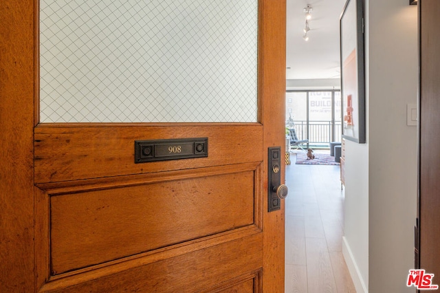 interior details with hardwood / wood-style flooring