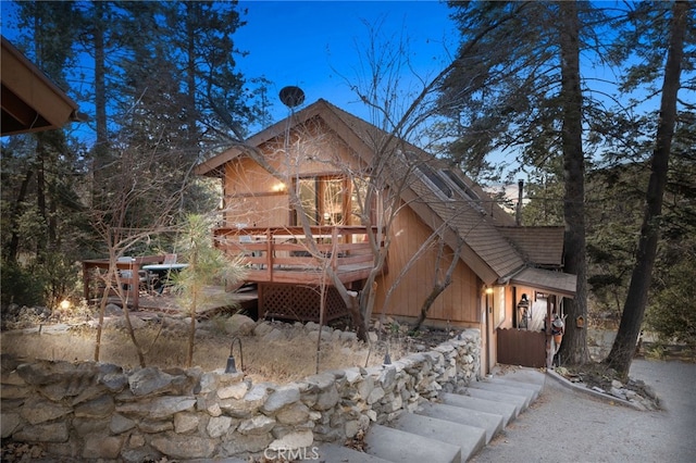 view of front of house featuring a wooden deck