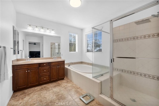 bathroom featuring independent shower and bath, vanity, and ceiling fan