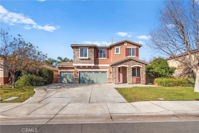 view of front of home with a front lawn and a garage