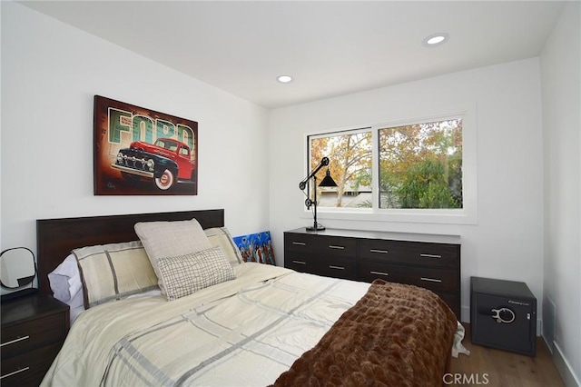 bedroom featuring wood-type flooring