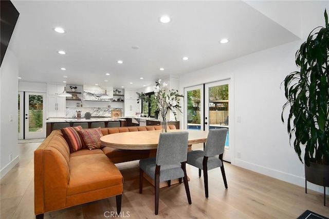 dining room with light hardwood / wood-style flooring