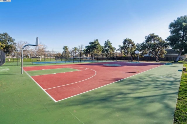 view of sport court with tennis court