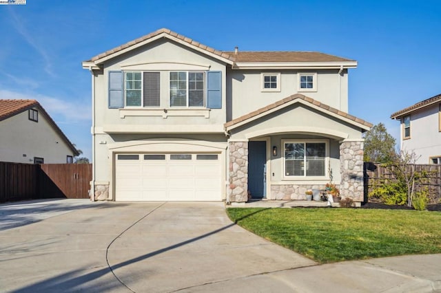 view of front property with a front lawn and a garage