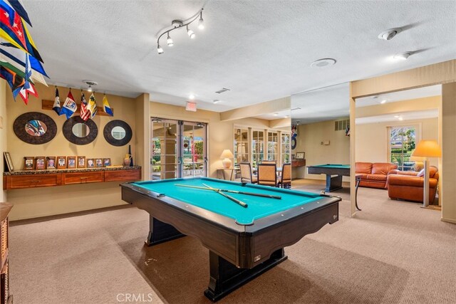 playroom with carpet, billiards, and a textured ceiling