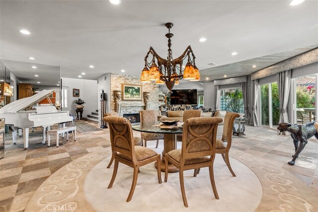 dining area featuring a fireplace