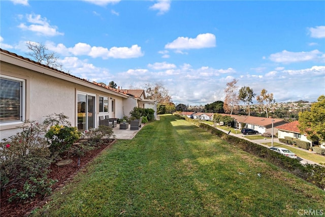 view of yard featuring a patio