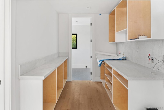 kitchen with light hardwood / wood-style flooring