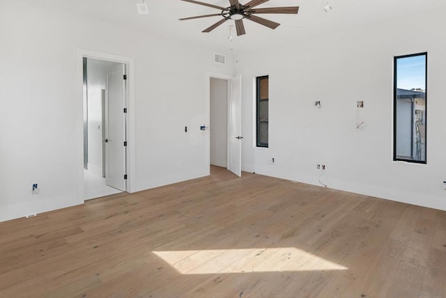 unfurnished room with light hardwood / wood-style floors and ceiling fan