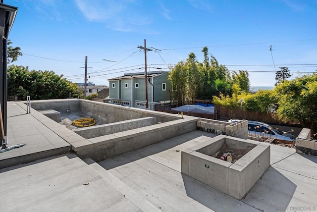 view of swimming pool featuring a patio area and an outdoor fire pit