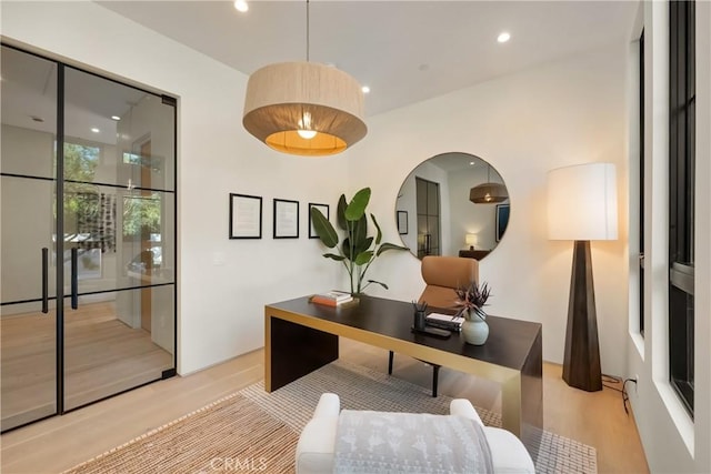 office area featuring light hardwood / wood-style floors