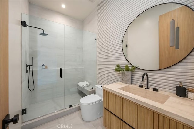 bathroom with toilet, tile patterned floors, an enclosed shower, and vanity