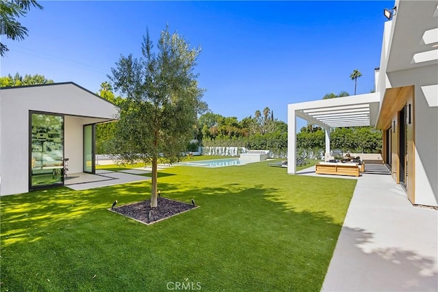 view of yard with a pergola, a patio area, and a pool