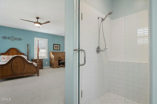 bathroom with walk in shower and ceiling fan