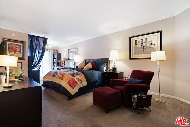 bedroom with carpet floors and crown molding