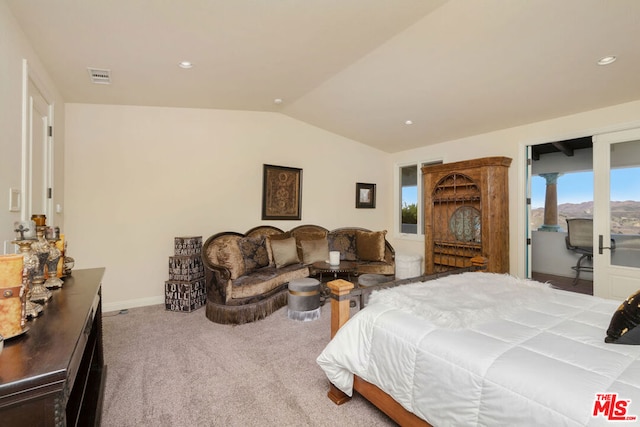 bedroom featuring carpet, access to outside, and vaulted ceiling