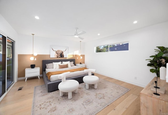 bedroom featuring ceiling fan and light wood-type flooring