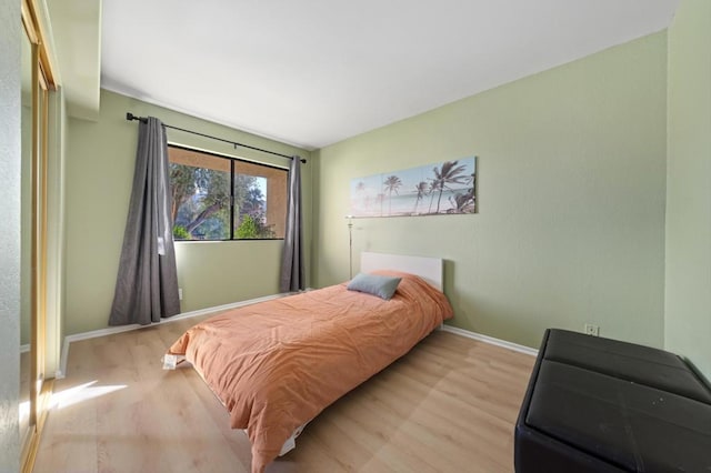 bedroom featuring light hardwood / wood-style floors