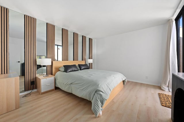 bedroom featuring light hardwood / wood-style flooring