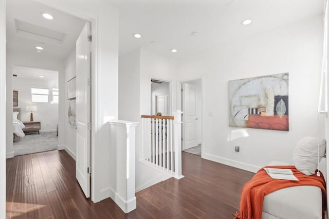 hall with dark hardwood / wood-style flooring