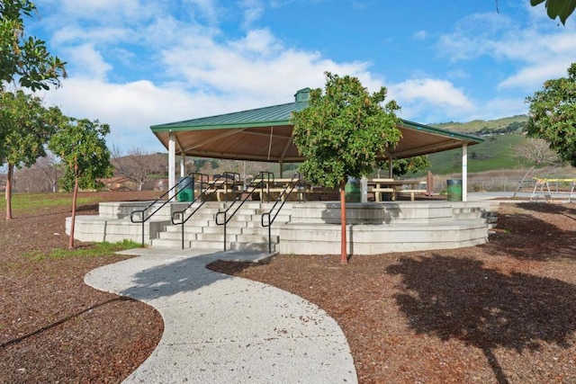 view of community with a gazebo and a playground