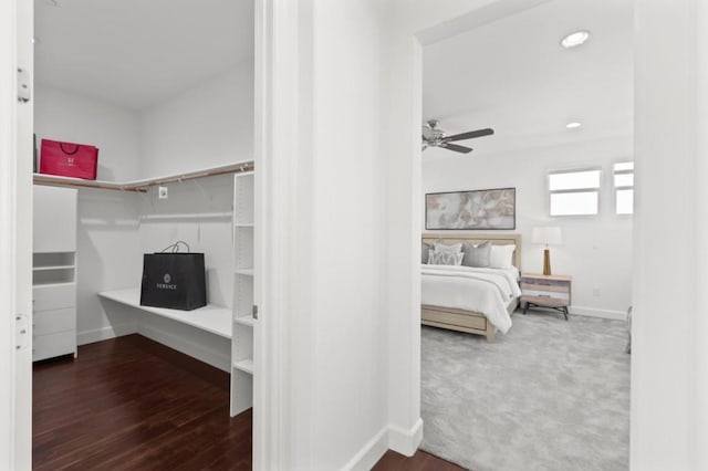 bedroom featuring ceiling fan and hardwood / wood-style floors