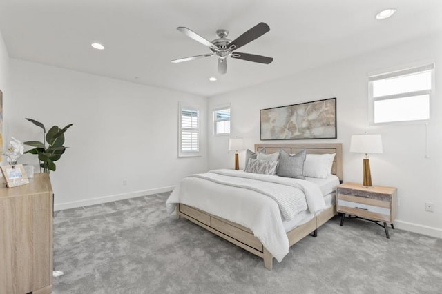 bedroom with ceiling fan and carpet