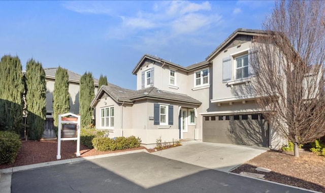 front of property featuring a garage