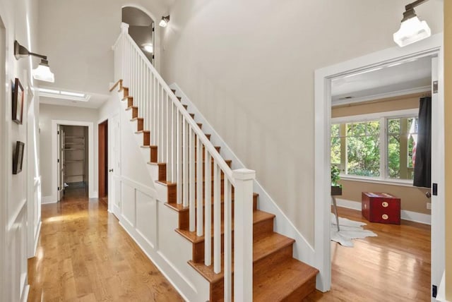 stairs with wood-type flooring