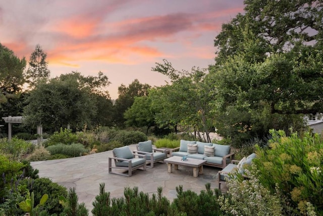 patio terrace at dusk with outdoor lounge area